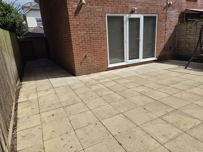A clean patio outside French doors.